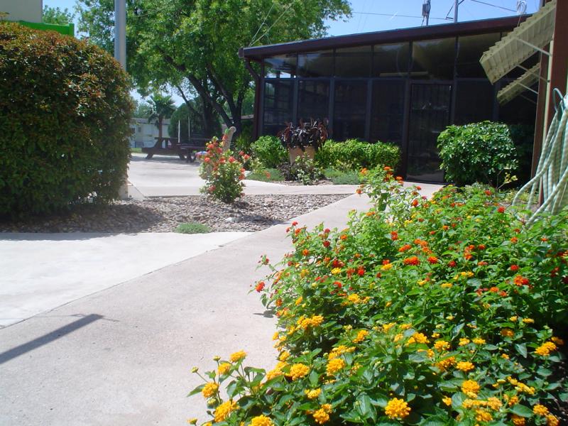 Walkway to Sunroom and Shuffleboard Courts